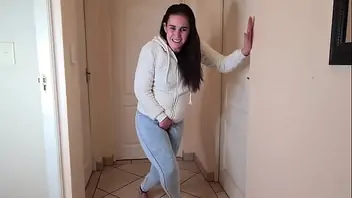 Girl pissing in jeans in public