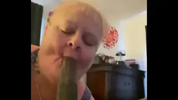 Granny slobs on black cock