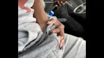 Fingering ebony in car