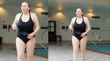 Sexy grandma is sexy at 66 in a black swimsuit