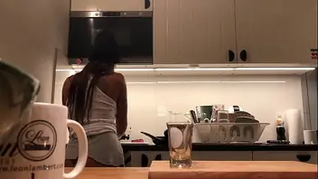 Cooking nude in the kitchen