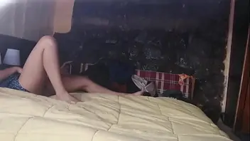 Fucking her while she lays down from the back